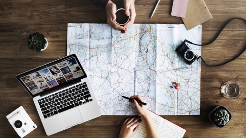 Map lying on wooden table